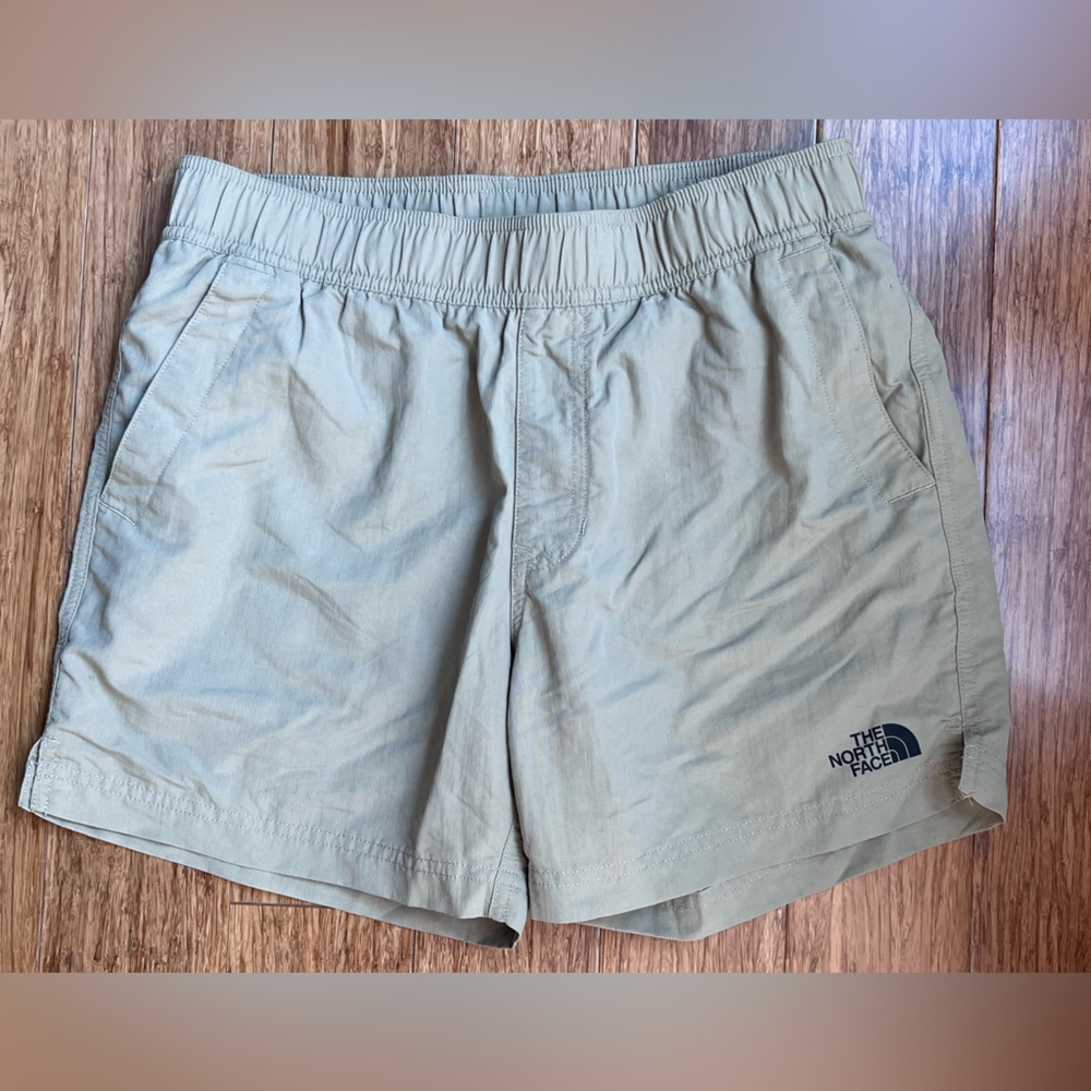The north face Mens swim trunks Khaki size small. 1015